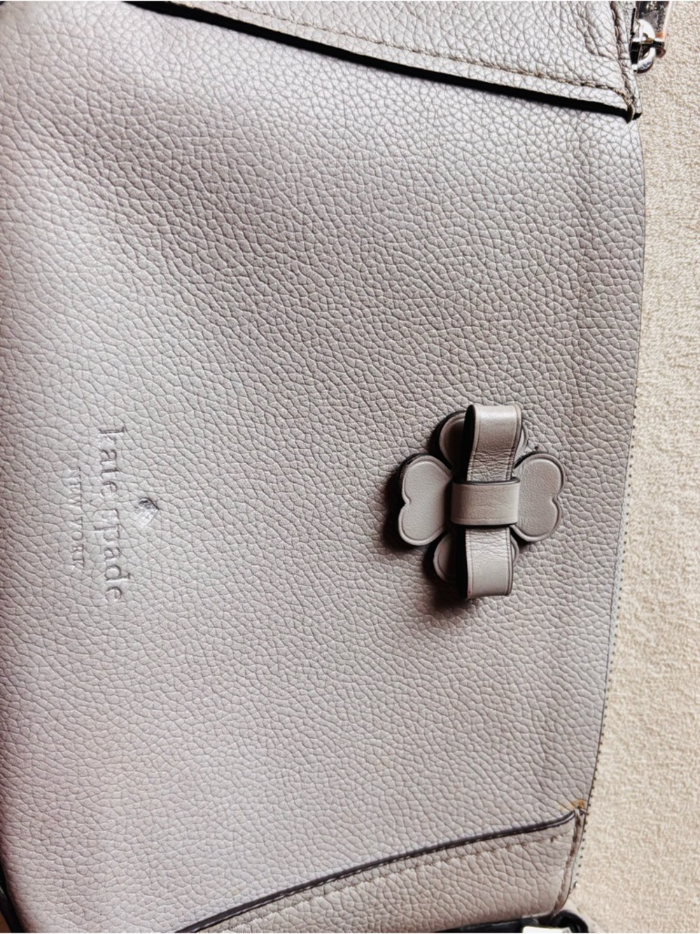 kate spade pebble leather crossbody in light taupe gray